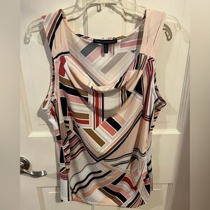 White House Black Market, light pink and tan geometric patterned sleeveless top.